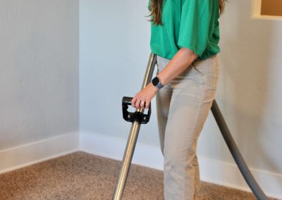 a chem-dry tech cleaning a carpet