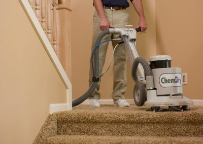 tech carpet cleaning on stairs